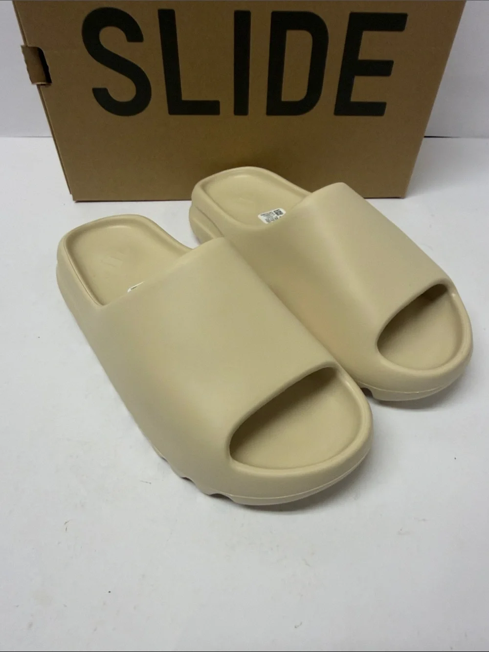 New men’s 11 Yeezy slides in cream BONE